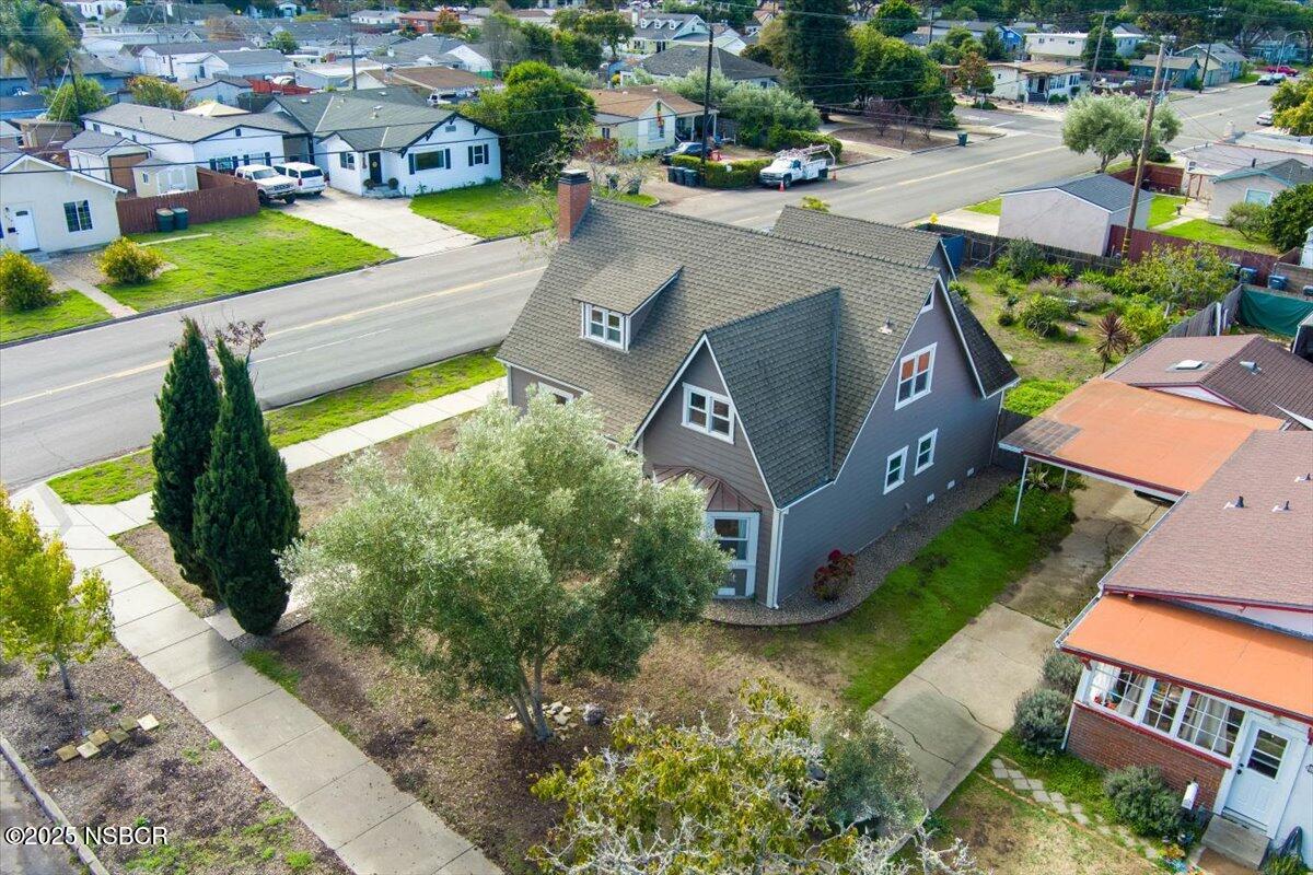 335 South F Street Lompoc, CA 93436 - Photo 39 of 44 an aerial view of a house with a garden