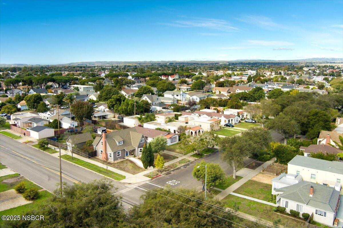 335 South F Street Lompoc, CA 93436 - Photo 40 of 44 an aerial view of residential houses with outdoor space