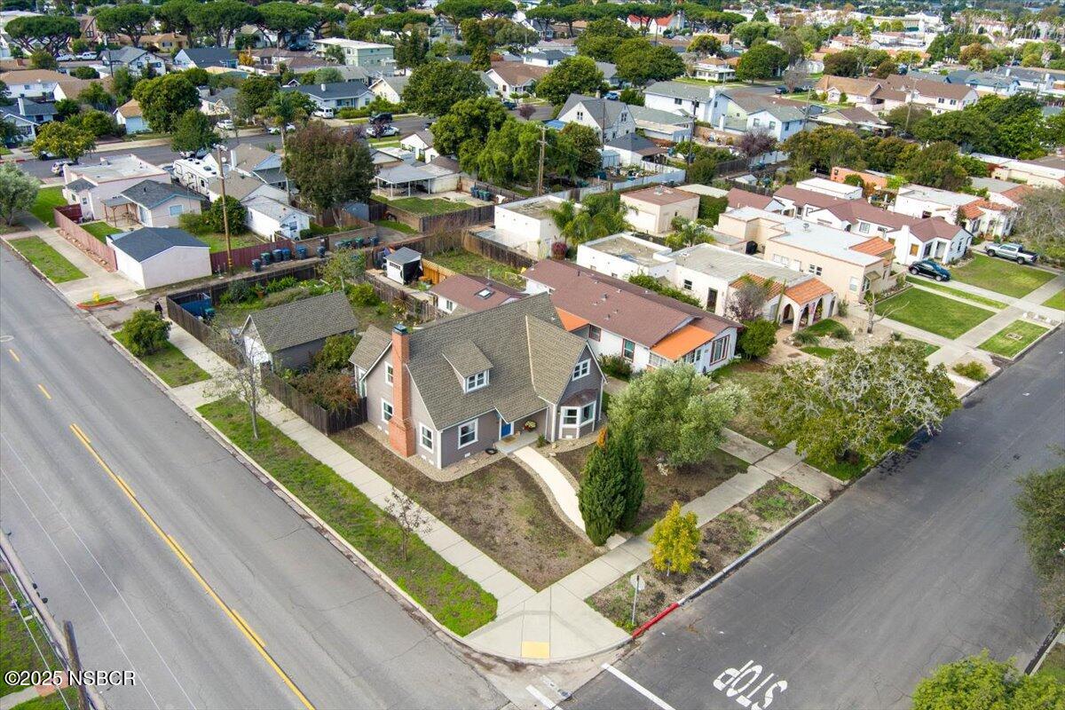 335 South F Street Lompoc, CA 93436 - Photo 42 of 44 an aerial view of a house with a yard