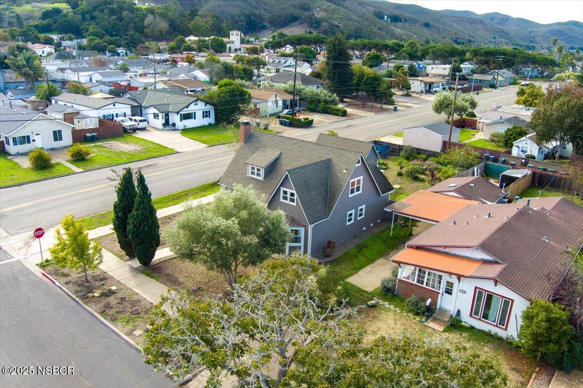 335 South F Street Lompoc, CA 93436 - Photo 43 of 44 an aerial view of residential houses with outdoor space and swimming pool