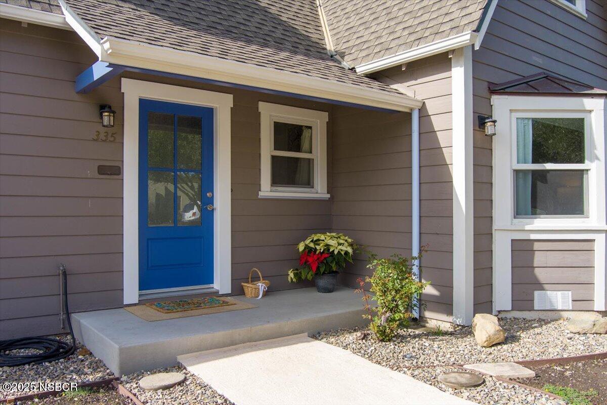 335 South F Street Lompoc, CA 93436 - Photo 5 of 44 a couple of flower plants in front of door