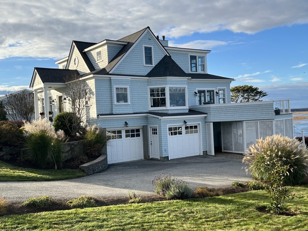 53 Skytop Road Ipswich, MA 01938 - Photo 2 of 7 a front view of a house with a yard