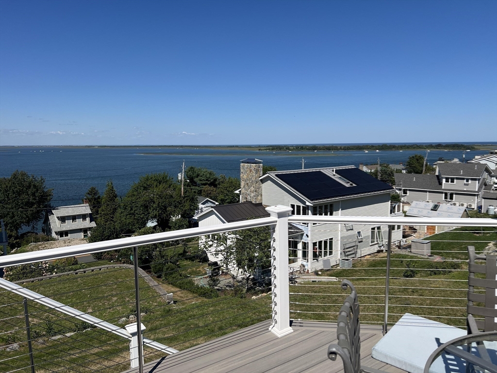53 Skytop Road Ipswich, MA 01938 - Photo 3 of 7 a view of a ocean from a balcony