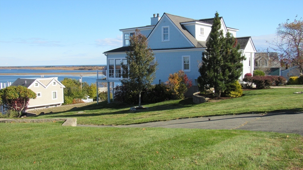 53 Skytop Road Ipswich, MA 01938 - Photo 7 of 7 a front view of a house with garden