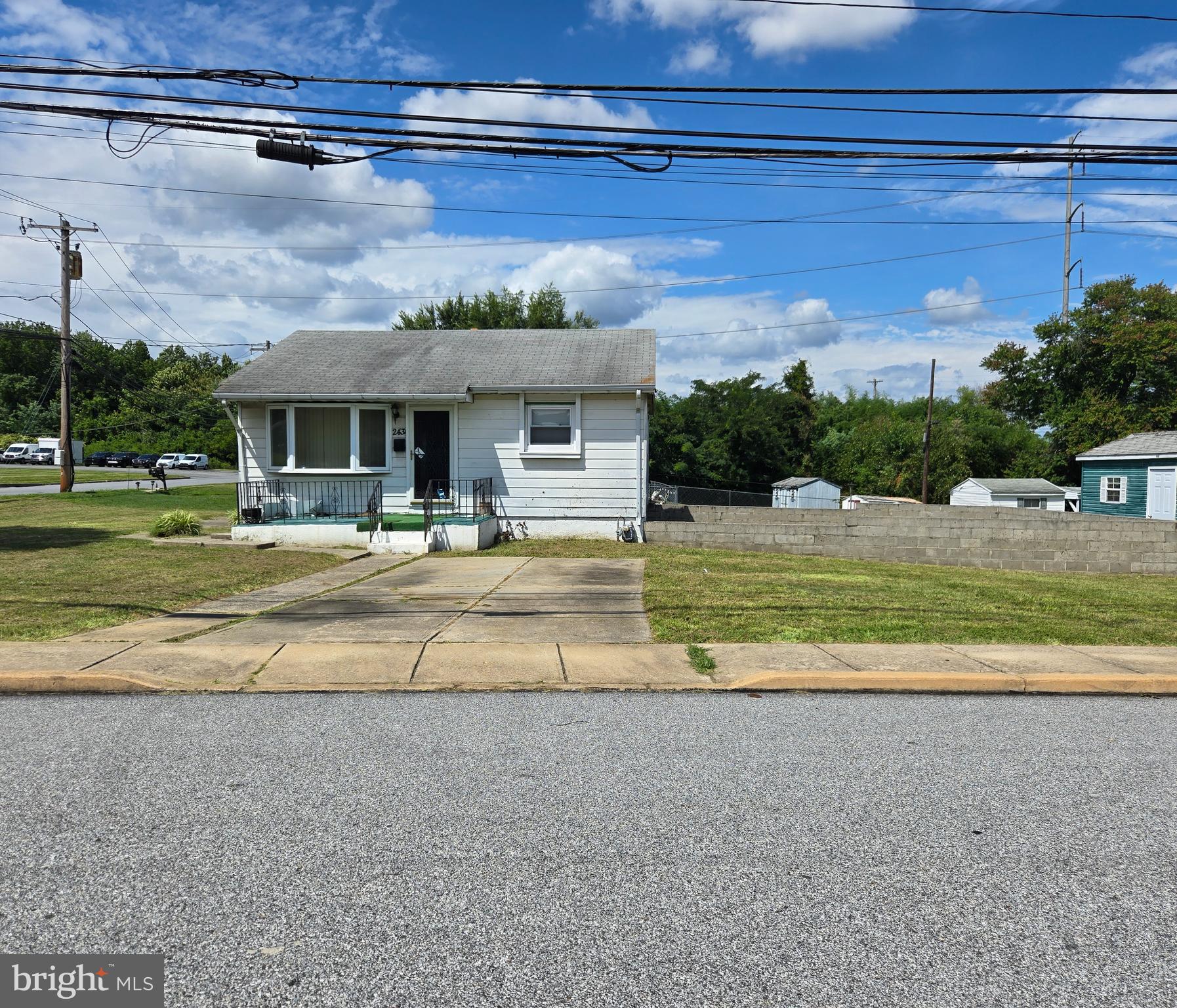 2434 Green Street Chester, PA 19013 - Photo 20 of 21 a view of a house with a porch and a yard