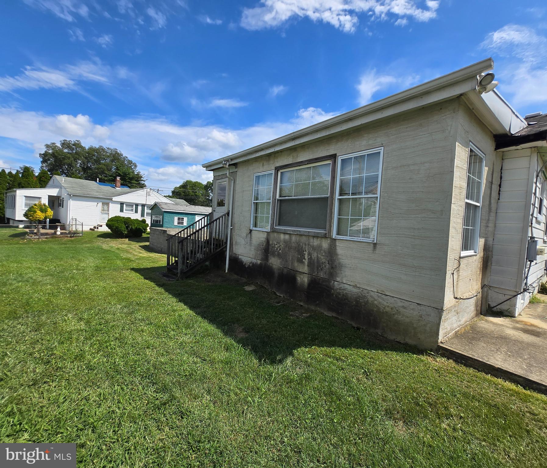 2434 Green Street Chester, PA 19013 - Photo 21 of 21 a backyard of a house with table and chairs