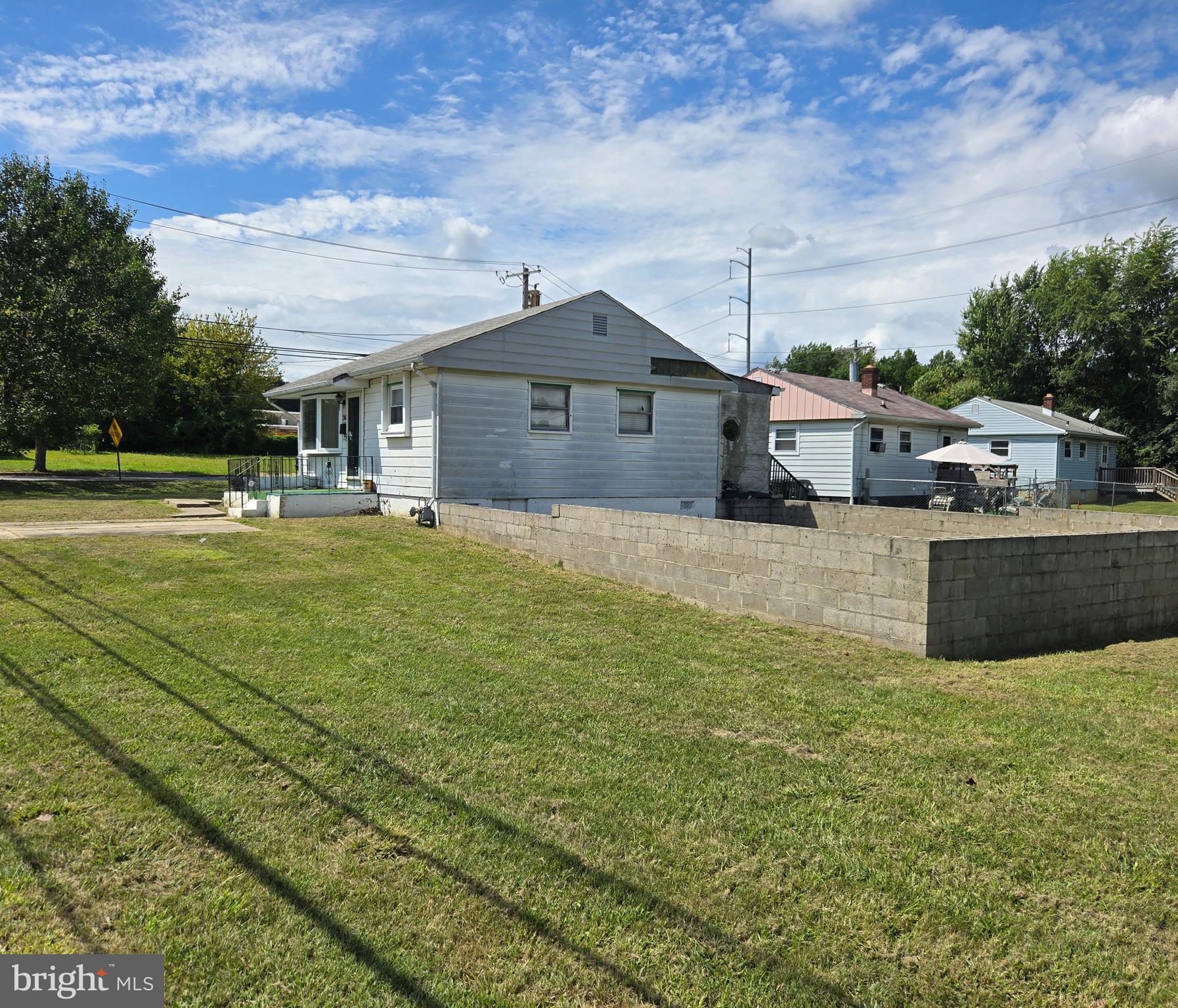 2434 Green Street Chester, PA 19013 - Photo 3 of 21 a large house with a big yard and large trees