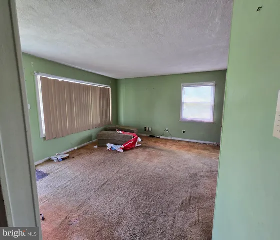 a view of a room with a sink and a window