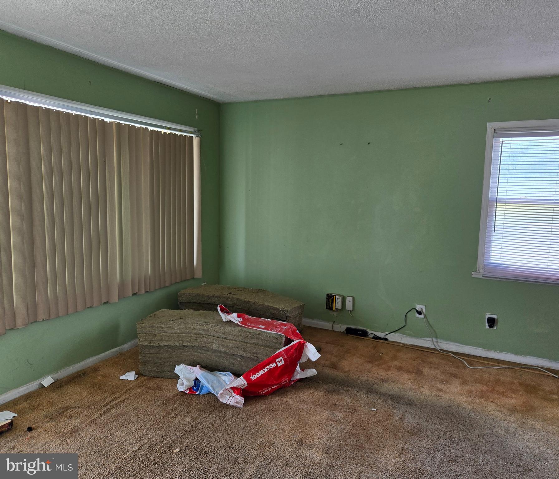 2434 Green Street Chester, PA 19013 - Photo 6 of 21 a bedroom with a bed and a window