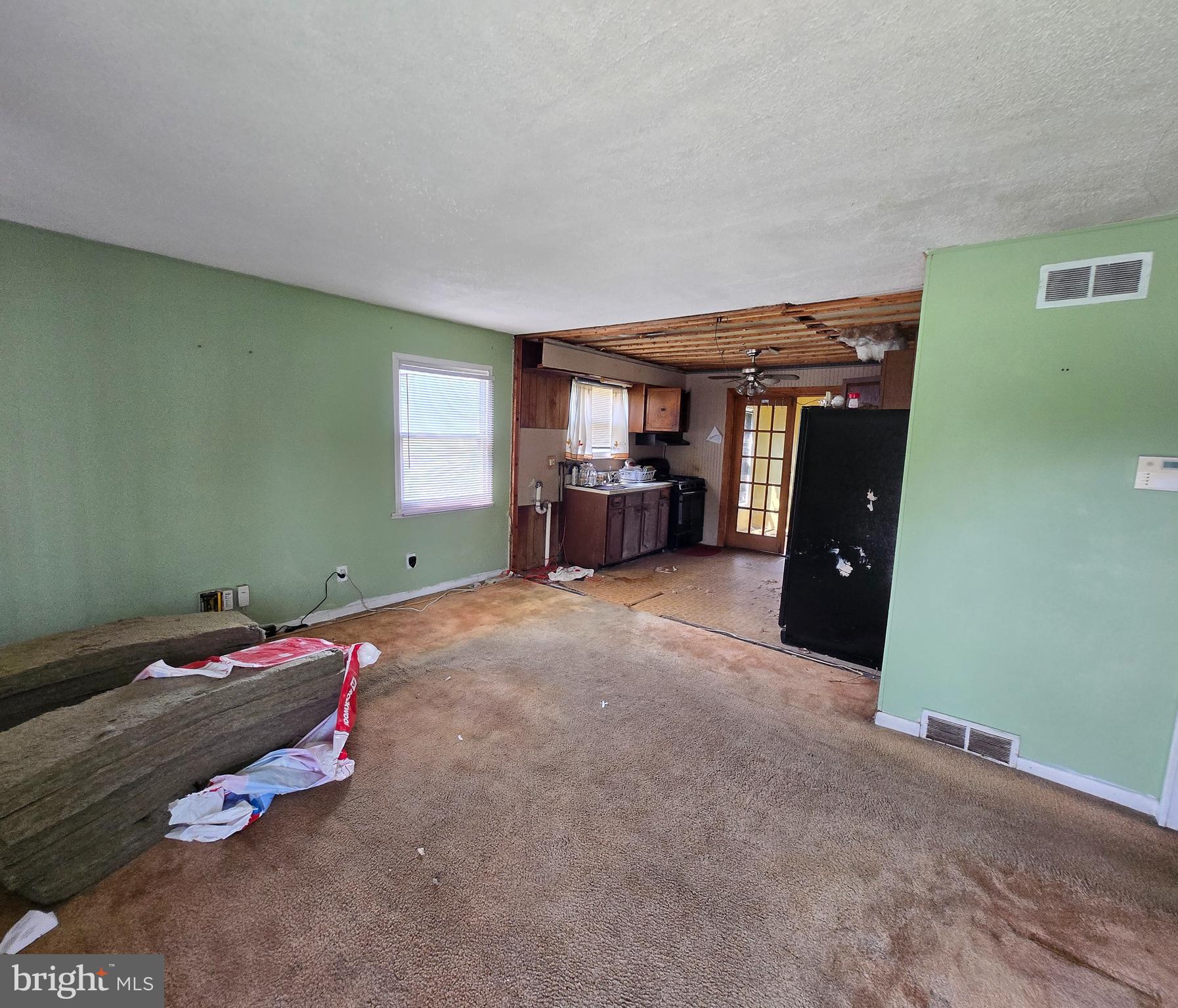 2434 Green Street Chester, PA 19013 - Photo 7 of 21 a bed room with a bed and furniture