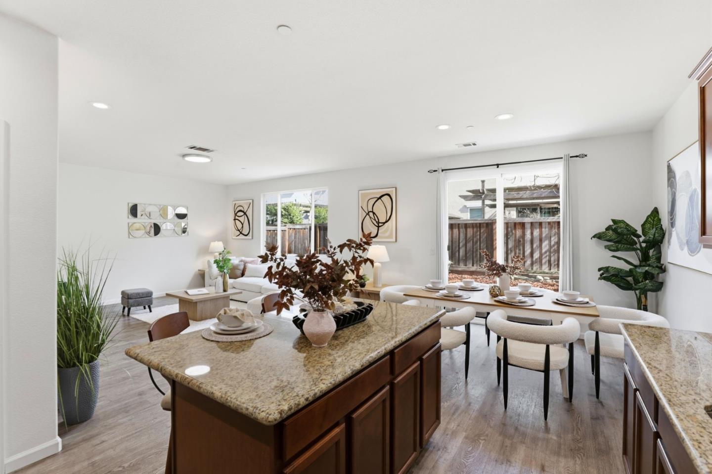 170 Sturla Way Gilroy, CA 95020 - Photo 16 of 64 a view of a dining room with furniture and wooden floor