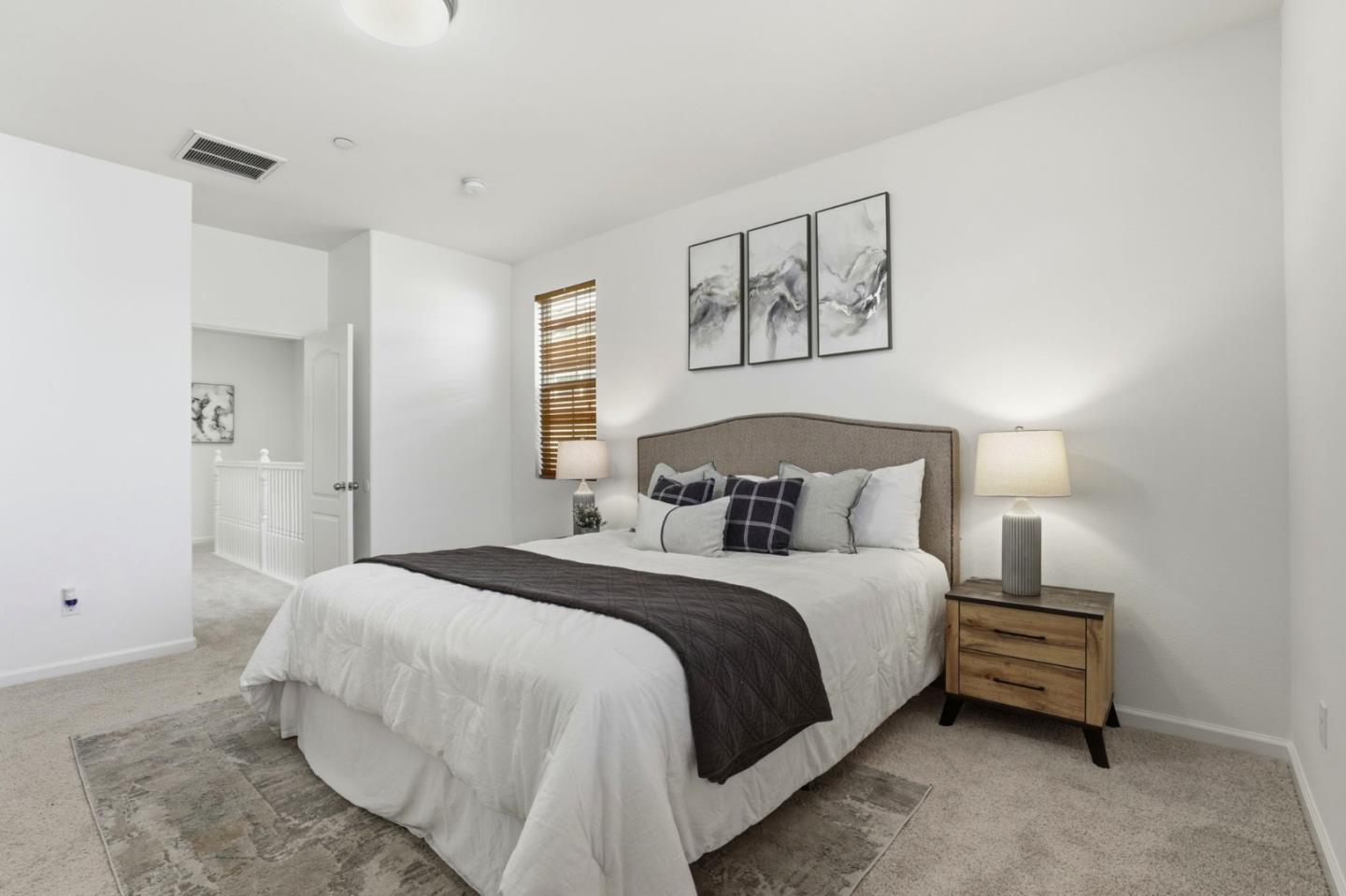 170 Sturla Way Gilroy, CA 95020 - Photo 23 of 64 a bedroom with a bed and a night stand