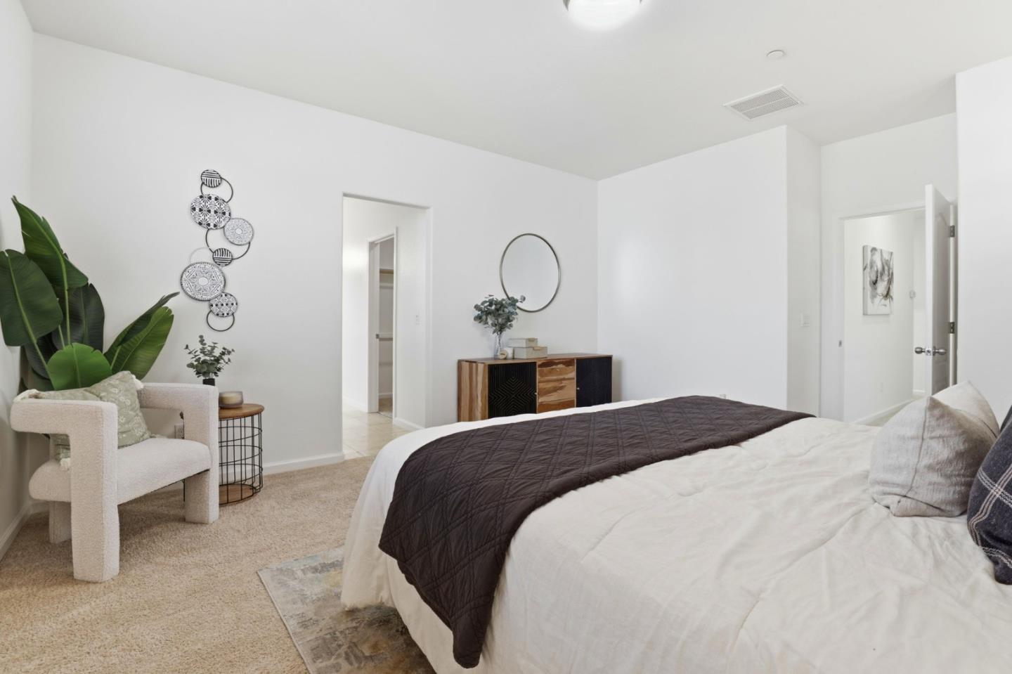 170 Sturla Way Gilroy, CA 95020 - Photo 24 of 64 a bedroom with a bed and a chair