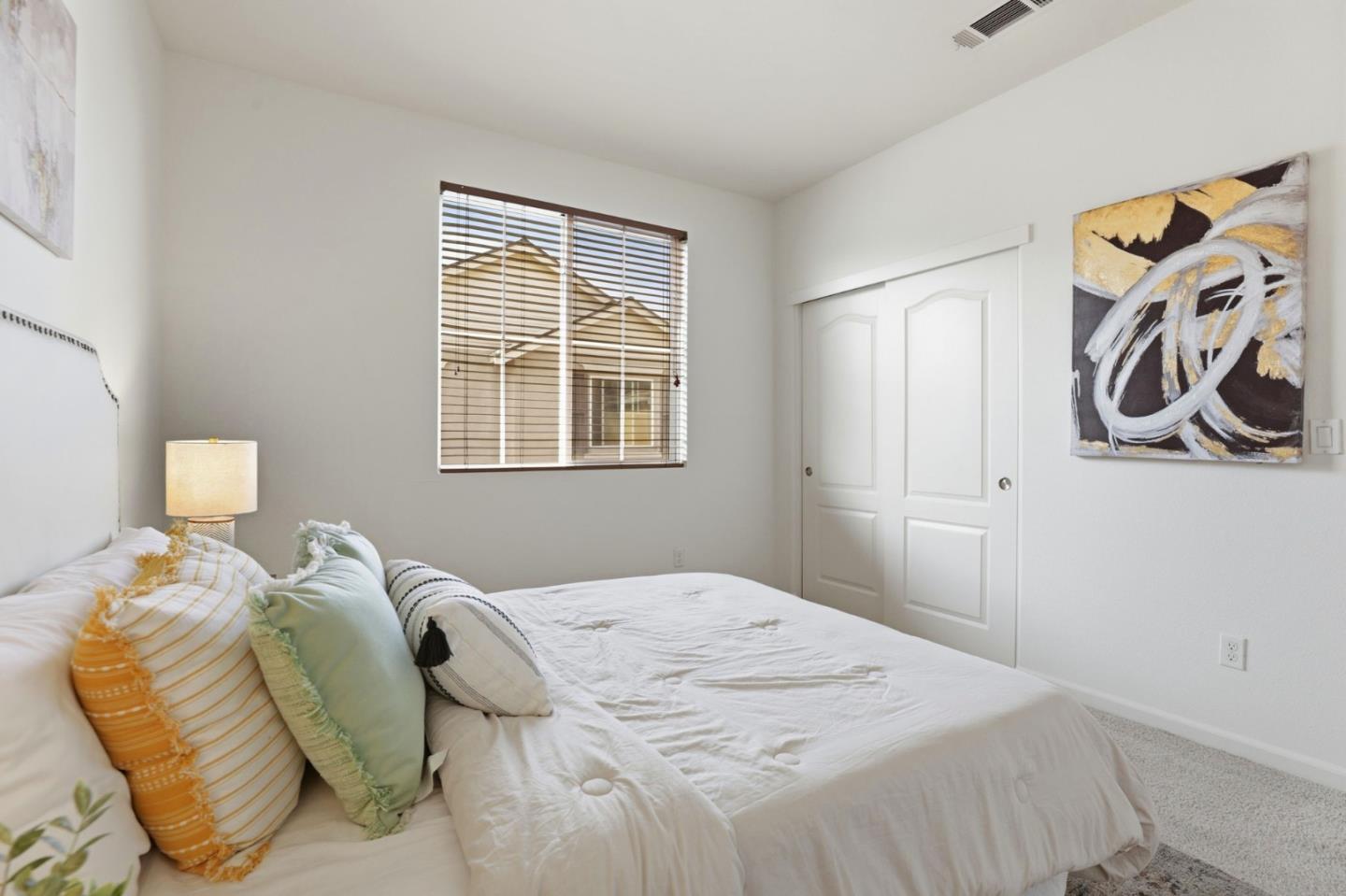 170 Sturla Way Gilroy, CA 95020 - Photo 28 of 64 a bedroom with a bed and next to a window