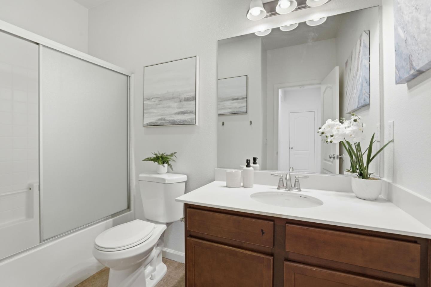170 Sturla Way Gilroy, CA 95020 - Photo 33 of 64 a bathroom with a sink toilet and shower