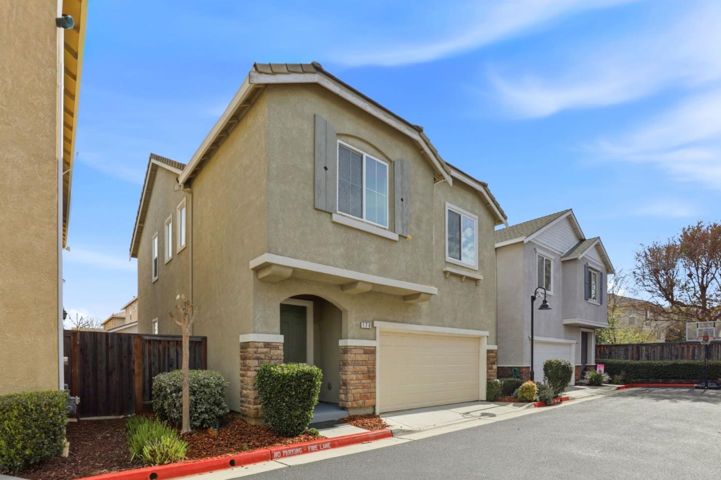170 Sturla Way Gilroy, CA 95020 - Photo 38 of 64 a front view of a house with a garage