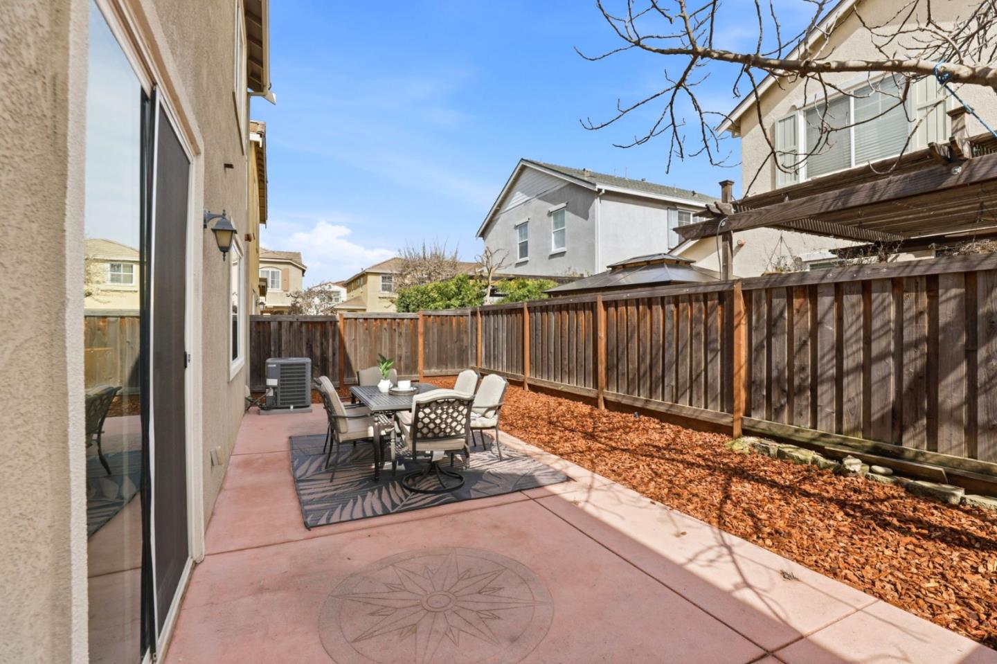 170 Sturla Way Gilroy, CA 95020 - Photo 42 of 64 a view of a patio with a table and chairs