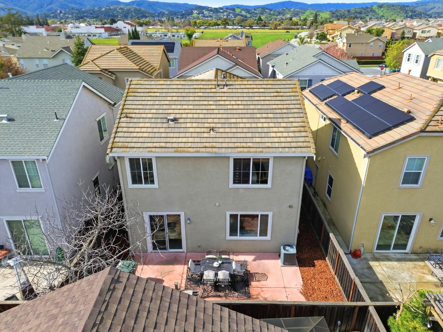 170 Sturla Way Gilroy, CA 95020 - Photo 58 of 64 a view of a house with backyard and sitting area