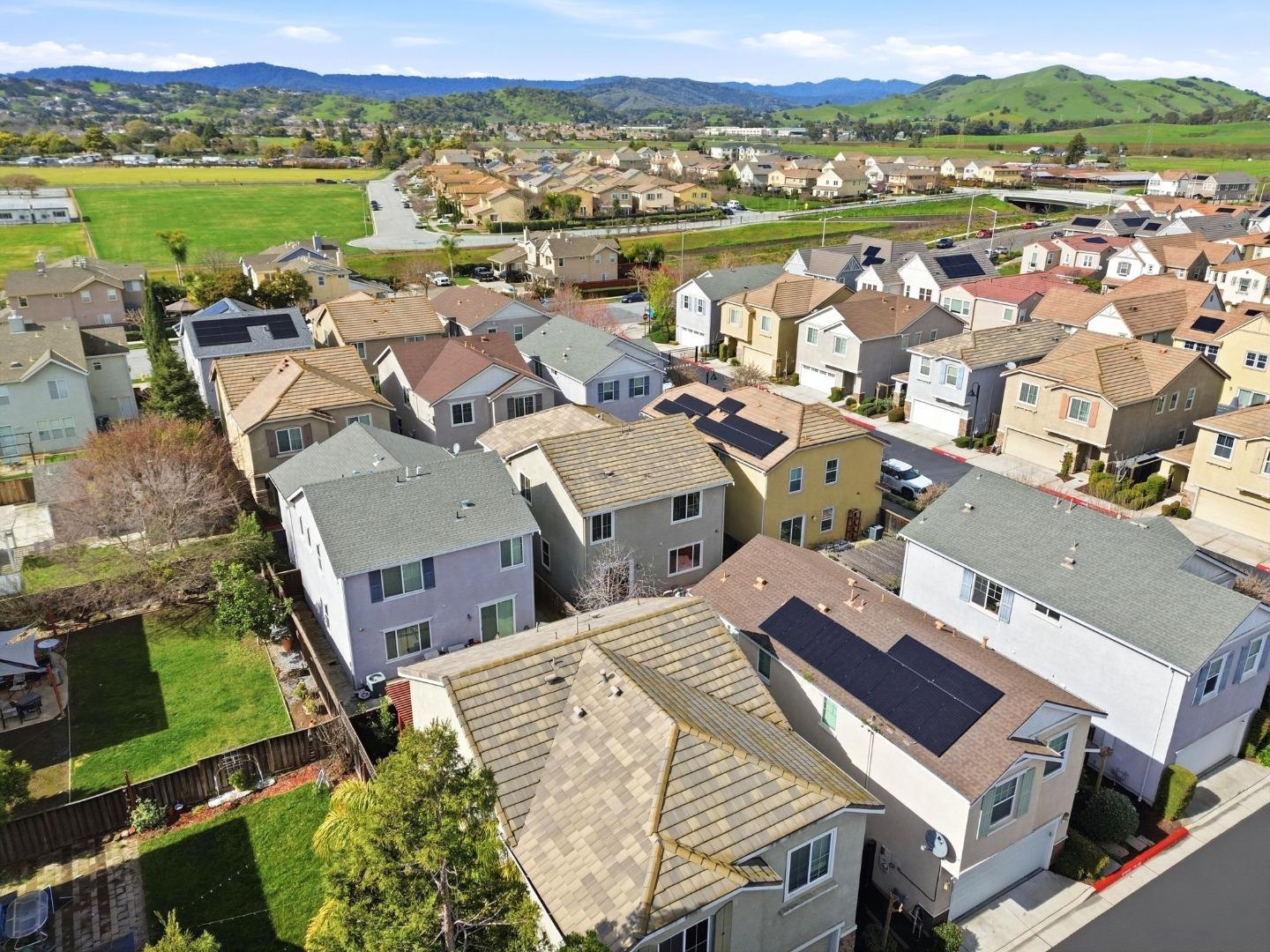 170 Sturla Way Gilroy, CA 95020 - Photo 62 of 64 an aerial view of a city with lots of residential buildings and ocean view