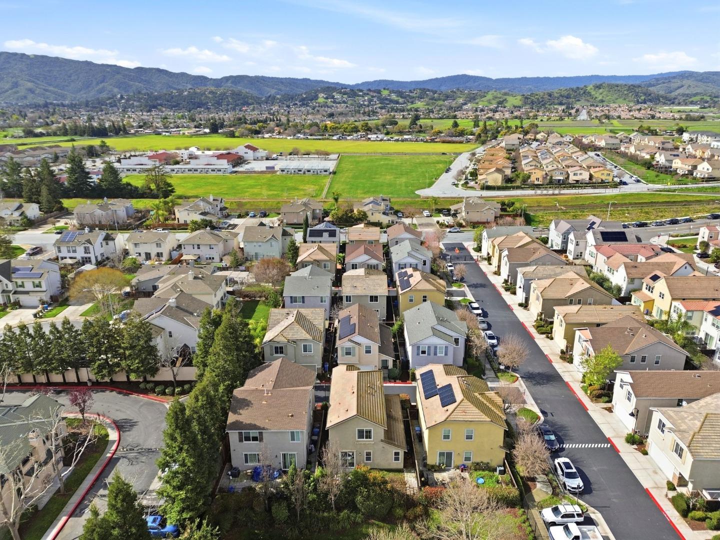 170 Sturla Way Gilroy, CA 95020 - Photo 63 of 64 an aerial view of a city with lots of residential buildings ocean and mountain view in back