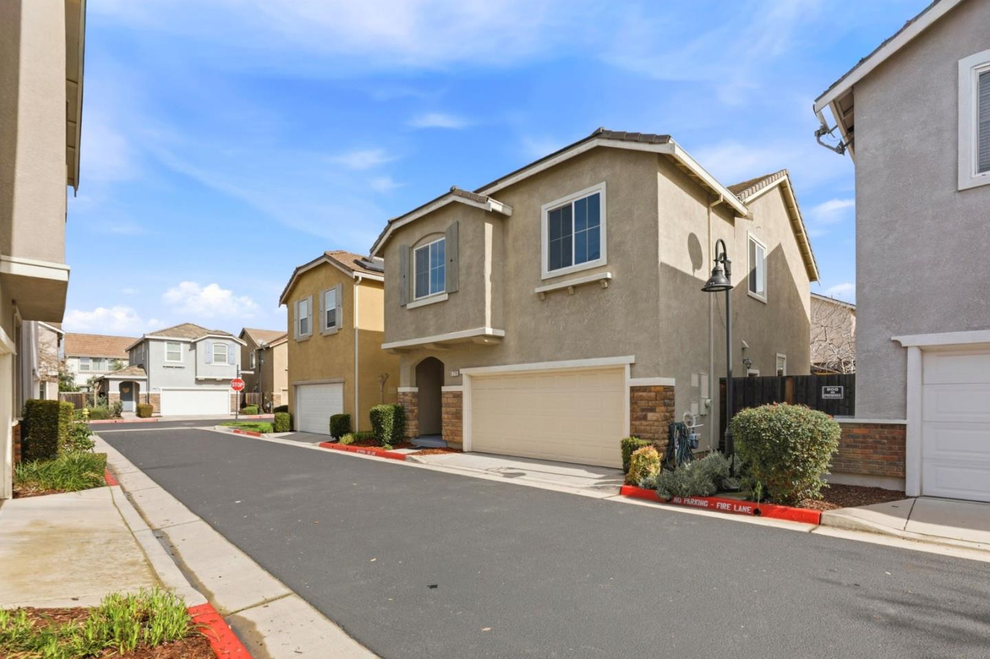 170 Sturla Way Gilroy, CA 95020 - Photo 7 of 64 a view of a street with a house