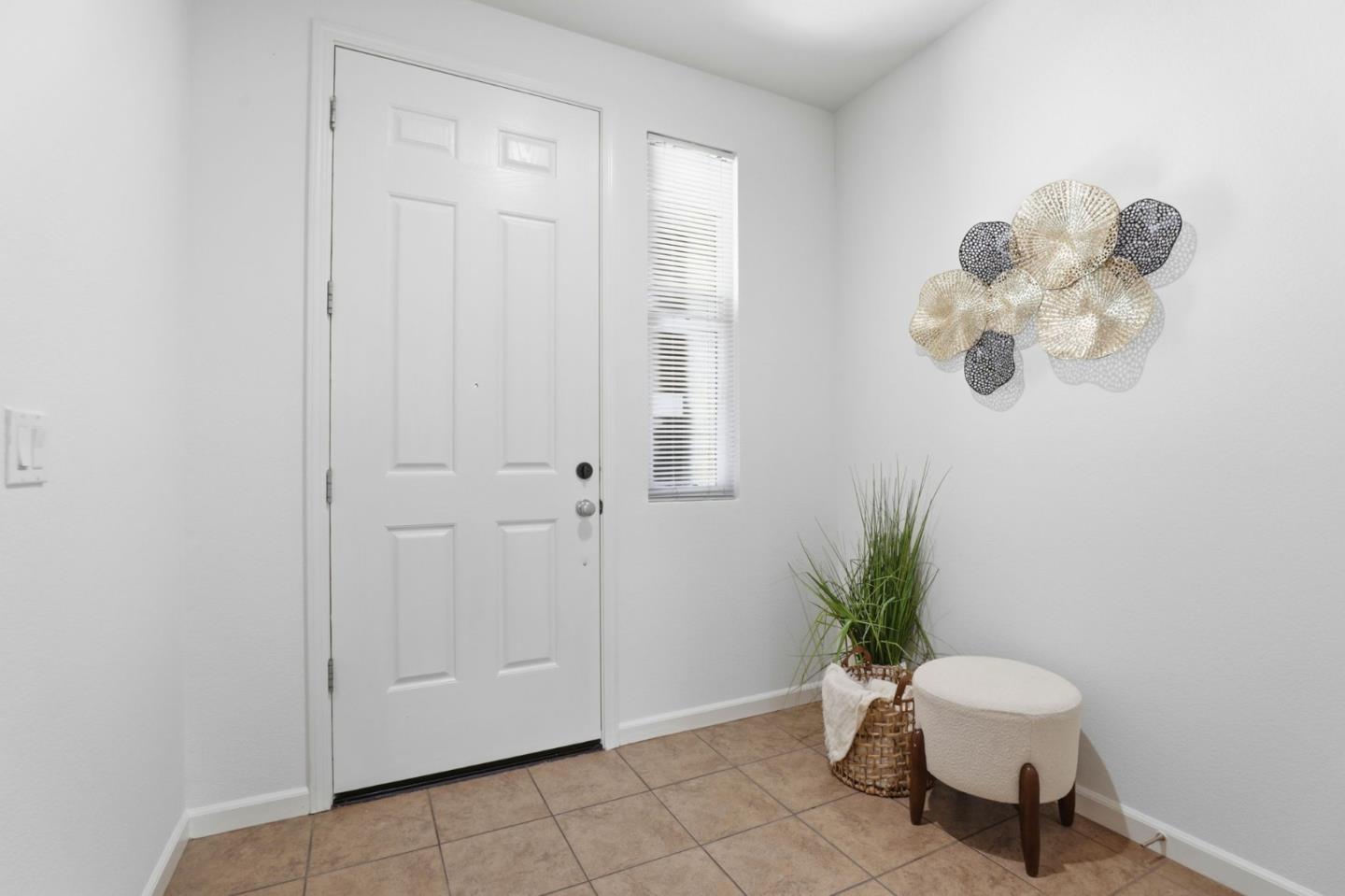 170 Sturla Way Gilroy, CA 95020 - Photo 8 of 64 a view of a room with a potted plant and a window