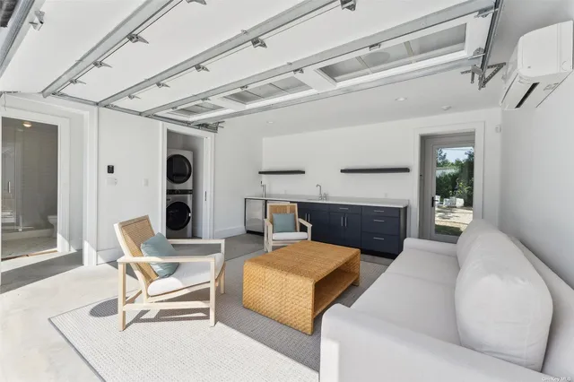 a living room with furniture and windows