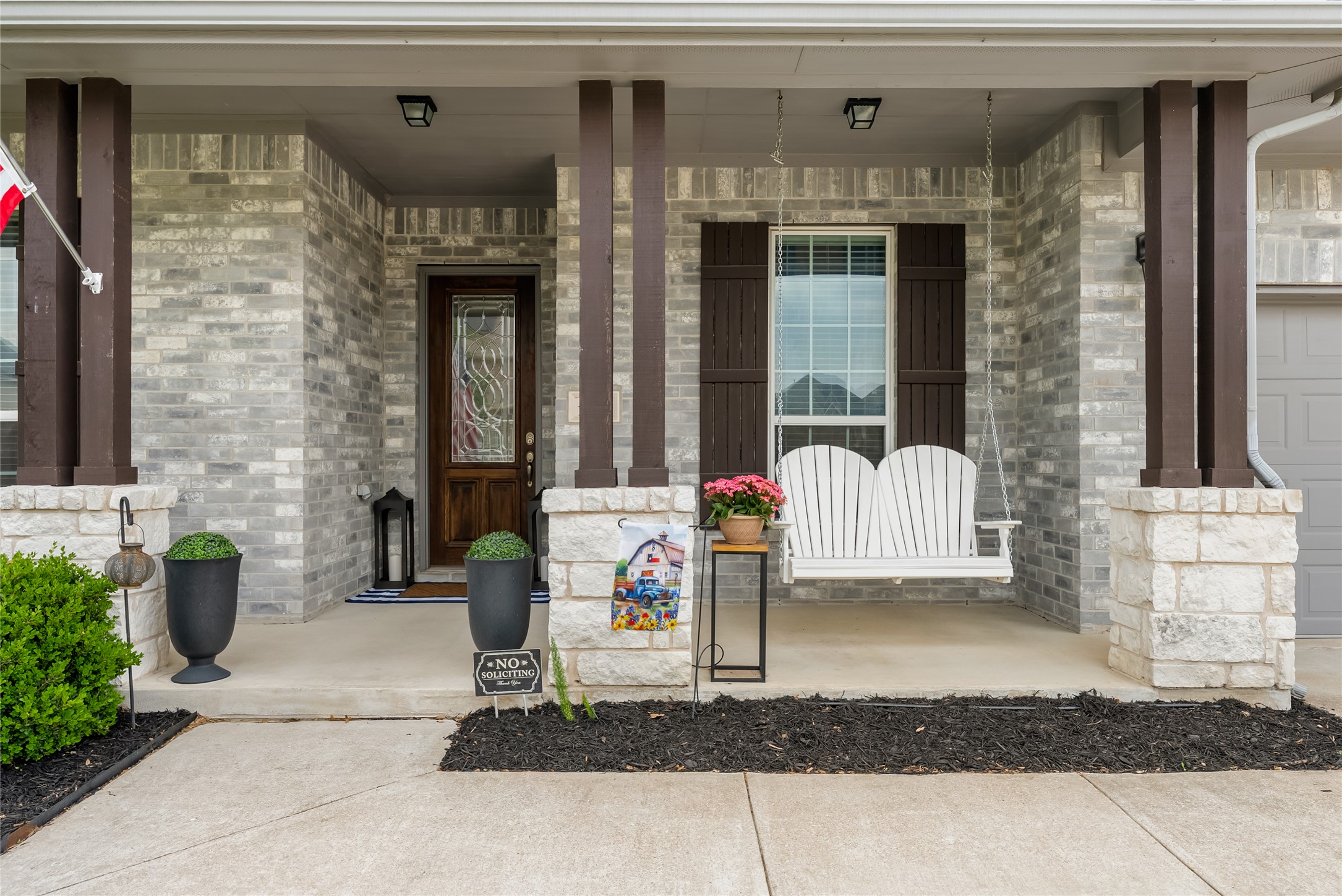 19901 Isle Of Glass Street Pflugerville, TX 78660 - Photo 2 of 40 a front view of a house with outdoor seating