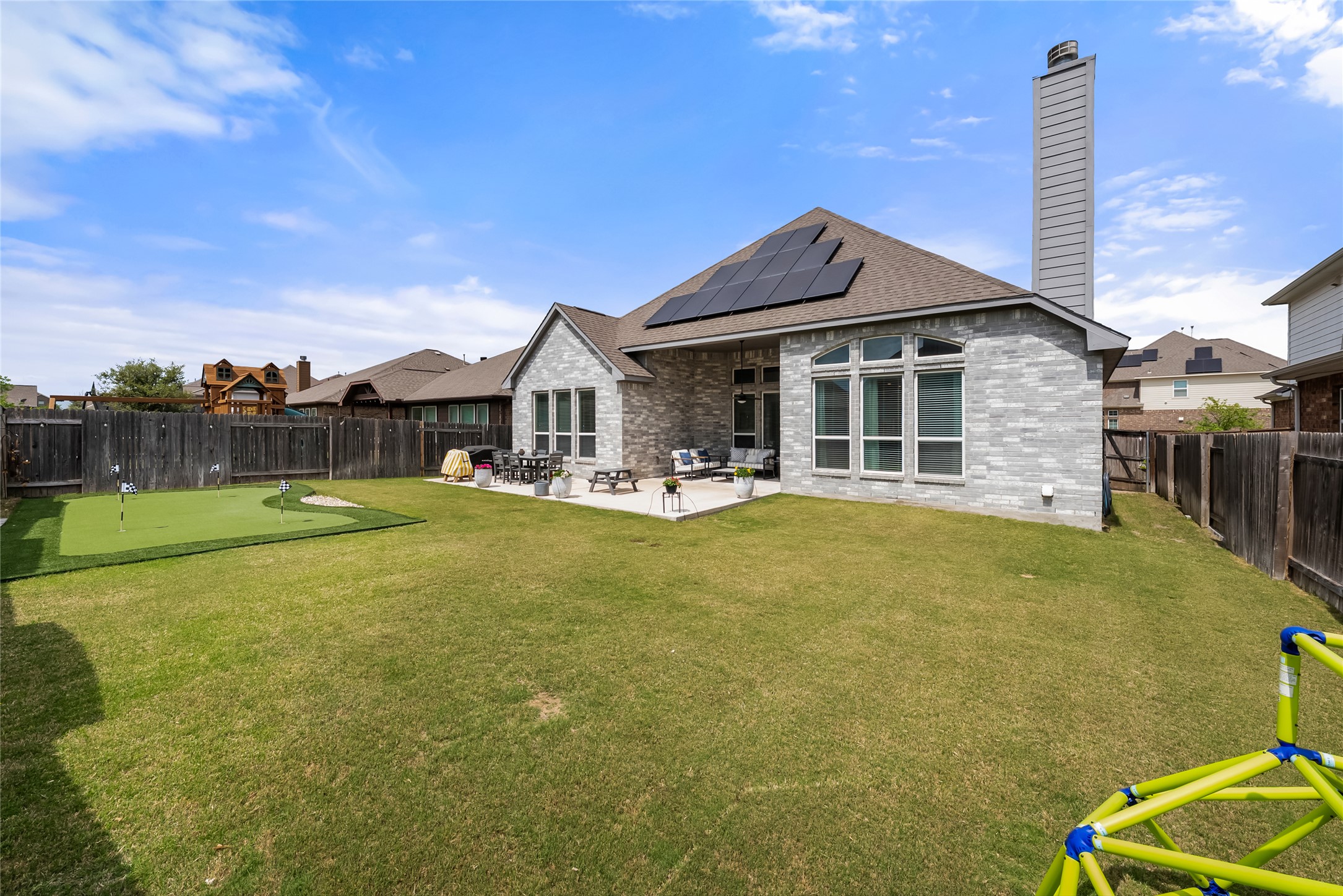 19901 Isle Of Glass Street Pflugerville, TX 78660 - Photo 31 of 40 a front view of a house with swimming pool