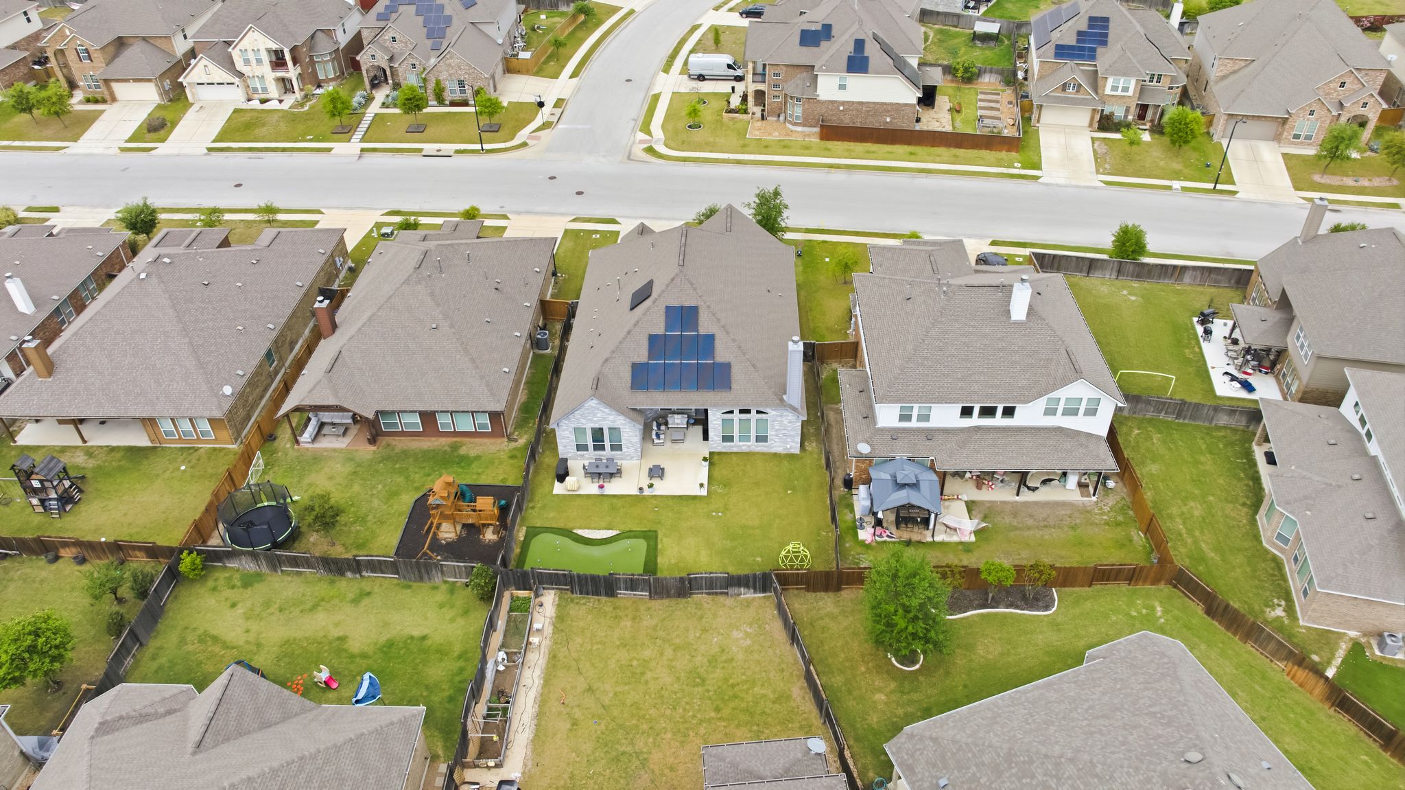 19901 Isle Of Glass Street Pflugerville, TX 78660 - Photo 37 of 40 an aerial view of residential houses with outdoor space and swimming pool