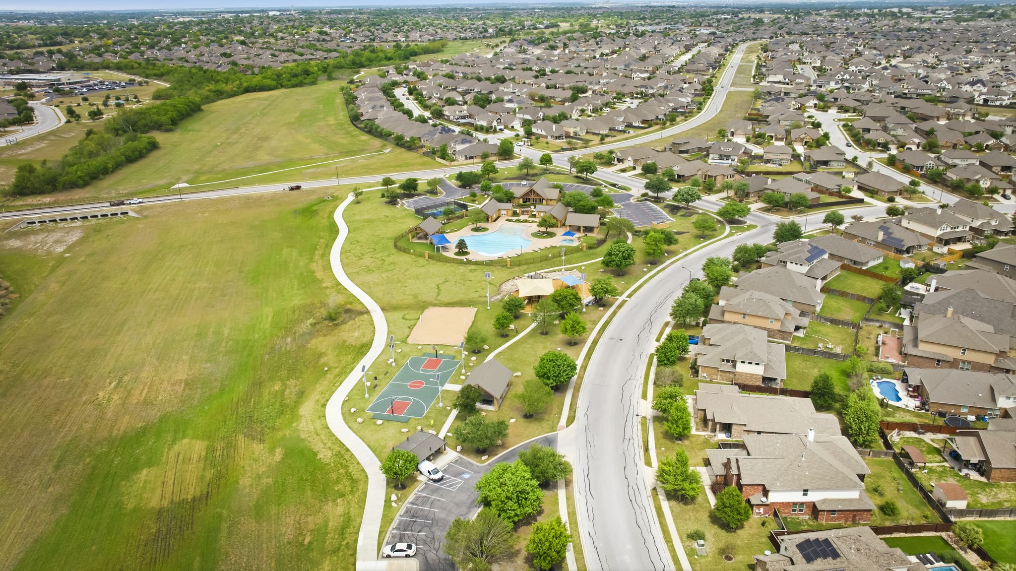 19901 Isle Of Glass Street Pflugerville, TX 78660 - Photo 38 of 40 an aerial view of a swimming pool
