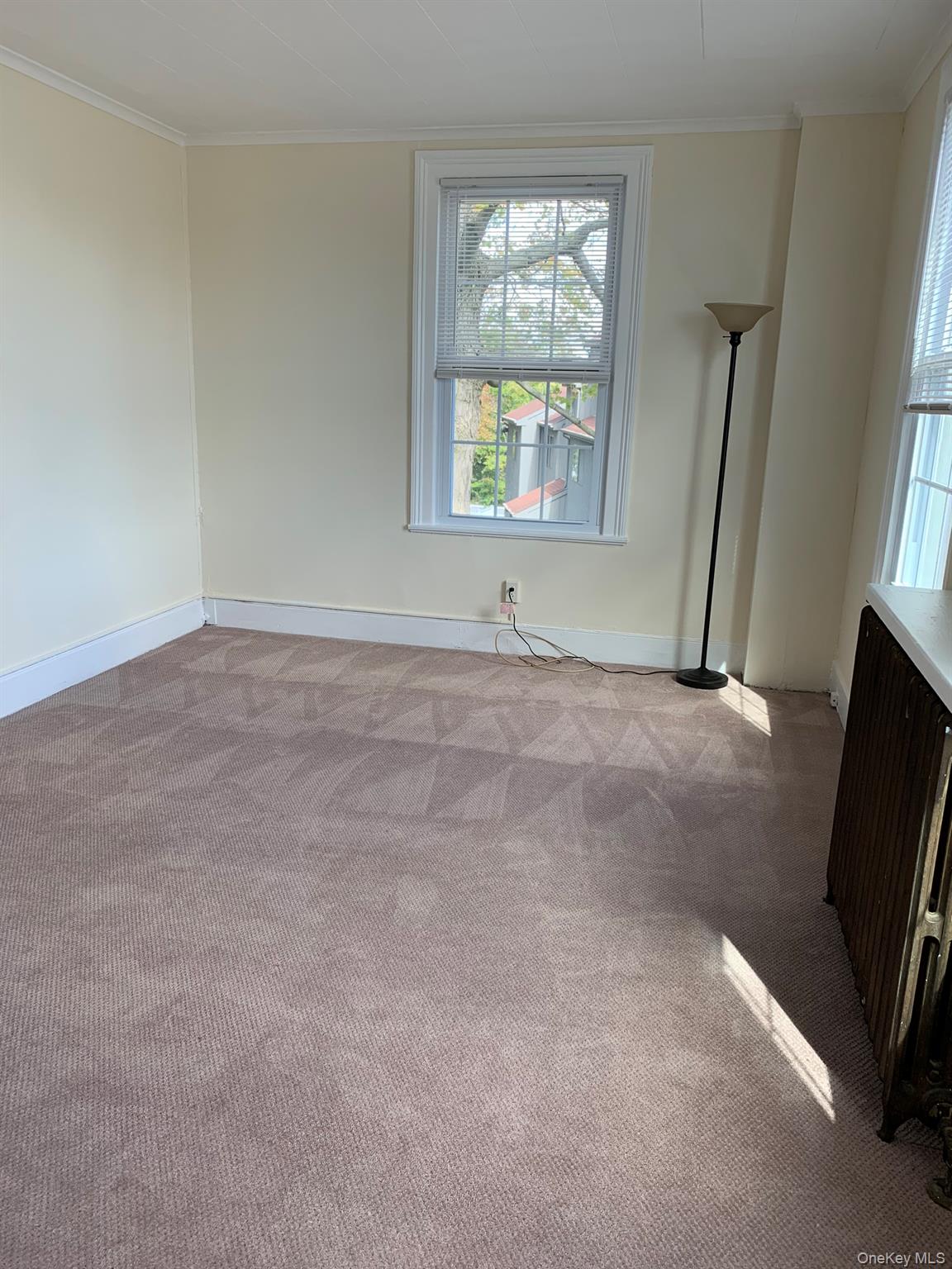 198 Flax Hill Road Norwalk, CT 06854 - Photo 4 of 12 an empty room with windows