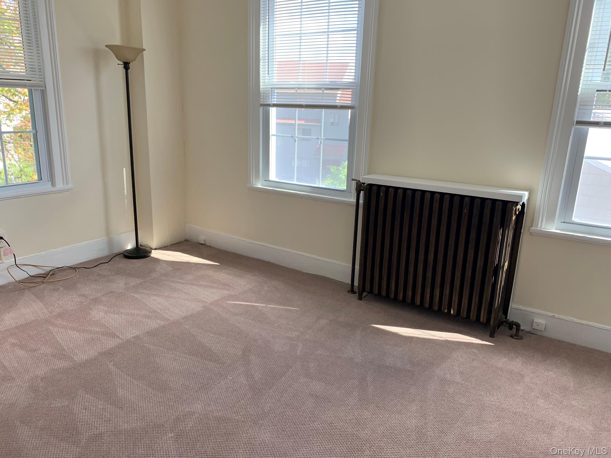 198 Flax Hill Road Norwalk, CT 06854 - Photo 7 of 12 an empty room with windows