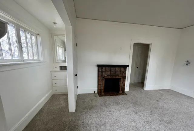 an empty room with windows