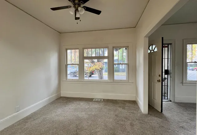 an empty room with windows