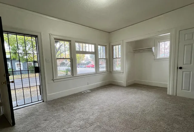 an empty room with windows