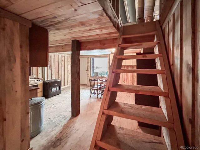 a view of livingroom with furniture and wooden floor