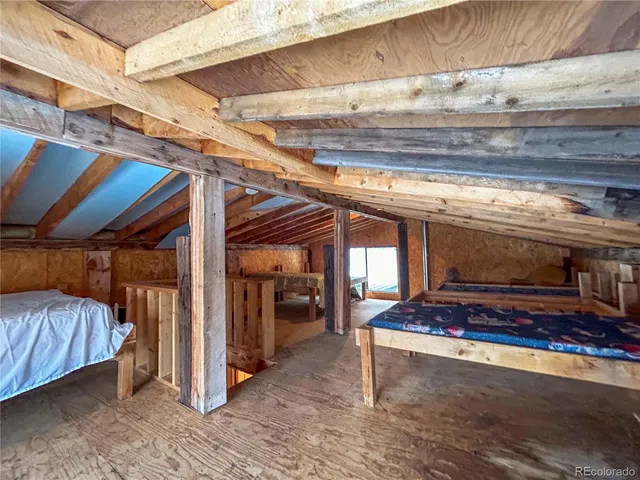 a view of a room with wooden roof