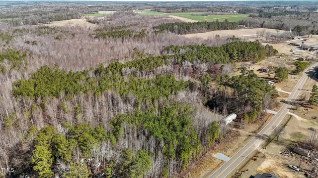 a view of a garden with a building