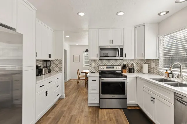 a view of a room with furniture window and wooden floor