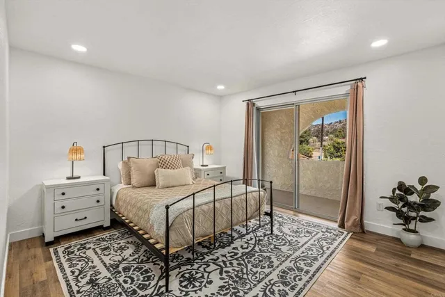 a view of a swimming pool with a yard