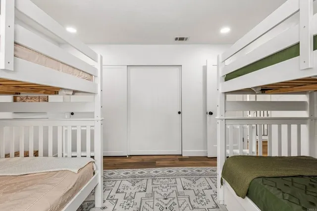 a view of a backyard with sitting area