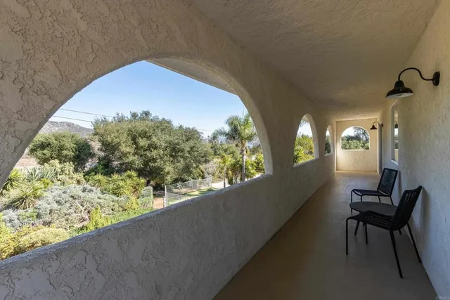 an aerial view of residential house with outdoor space