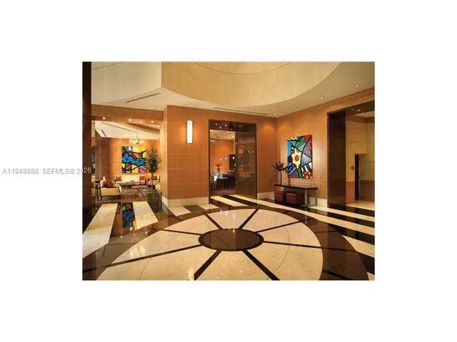 a outdoor living space with furniture and a fireplace