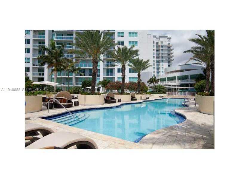 244 Biscayne Boulevard, Unit 702 Miami, FL 33132 - Photo 6 of 12 a view of a swimming pool and outdoor space