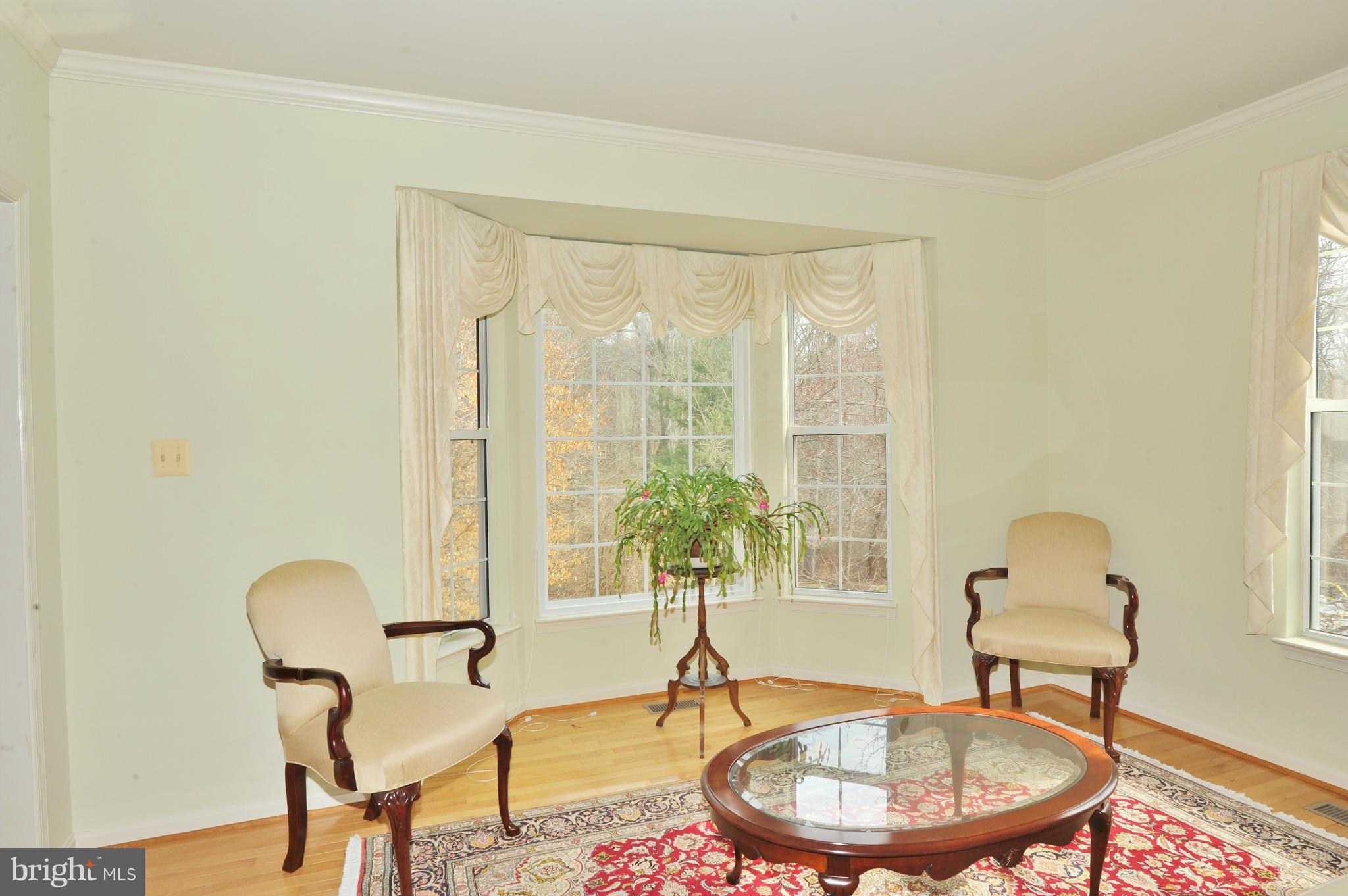 5700 Clapham Road Alexandria, VA 22315 - Photo 11 of 30 a living room with furniture and a window