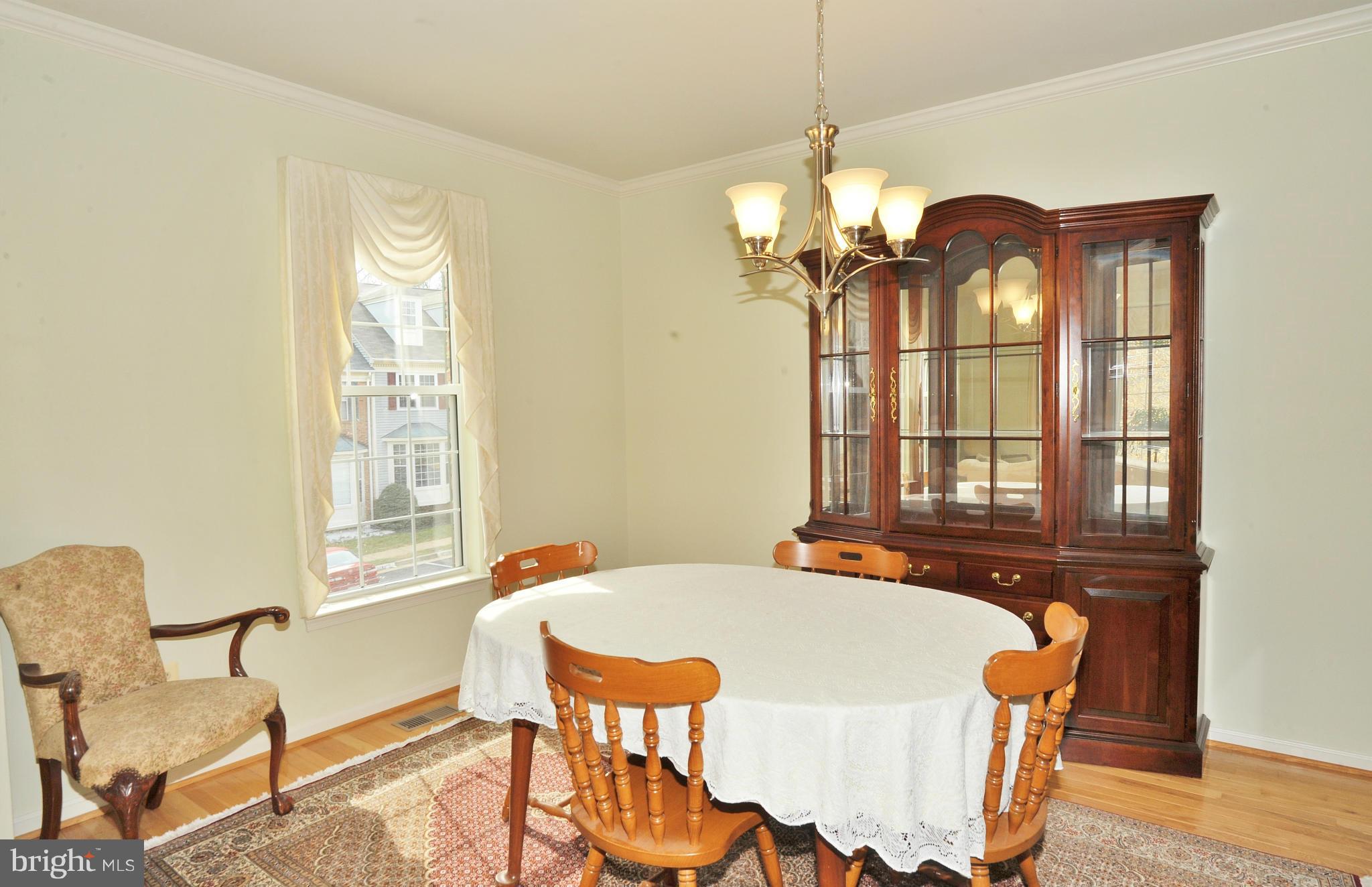 5700 Clapham Road Alexandria, VA 22315 - Photo 14 of 30 a dining room with furniture and window