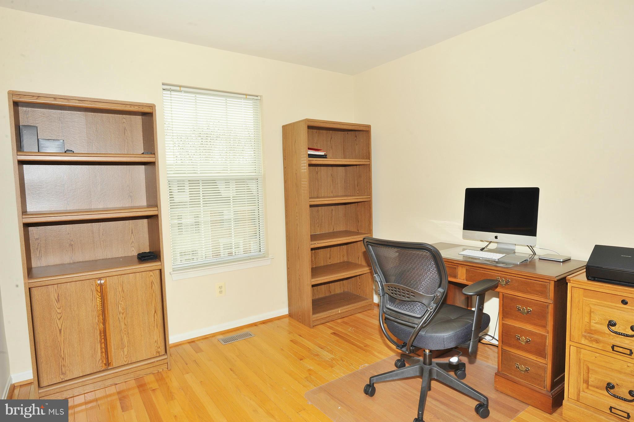 5700 Clapham Road Alexandria, VA 22315 - Photo 24 of 30 a view of a workspace with furniture and a window