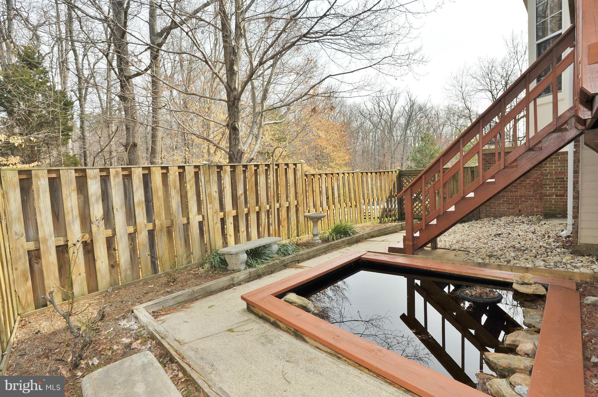 5700 Clapham Road Alexandria, VA 22315 - Photo 30 of 30 a view of a backyard with wooden fence