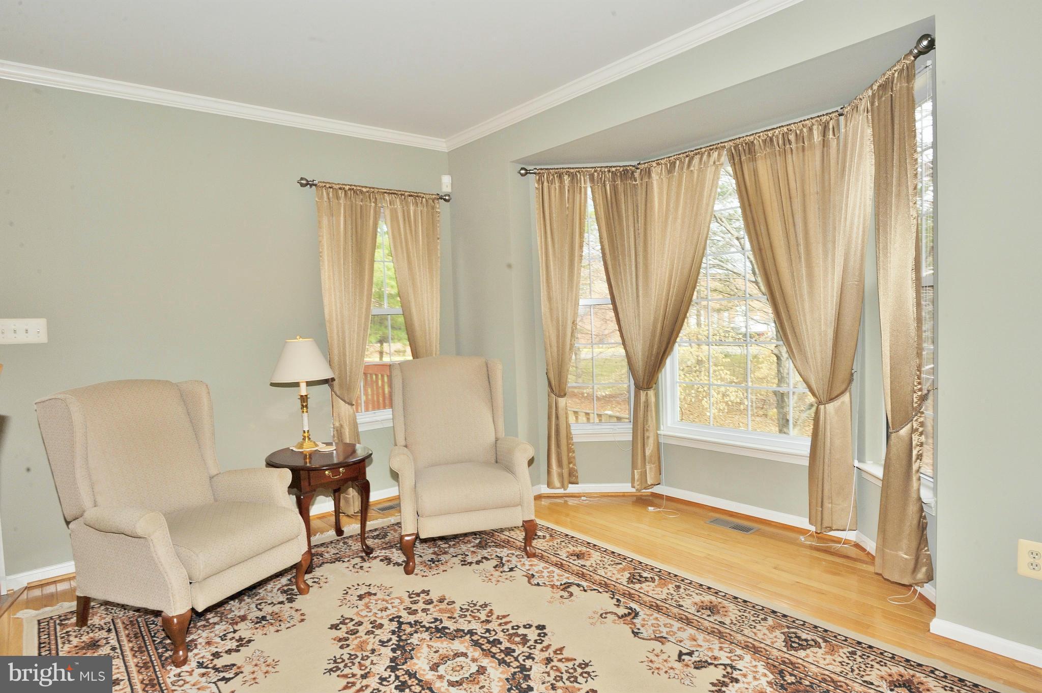 5700 Clapham Road Alexandria, VA 22315 - Photo 8 of 30 a living room with furniture and a window
